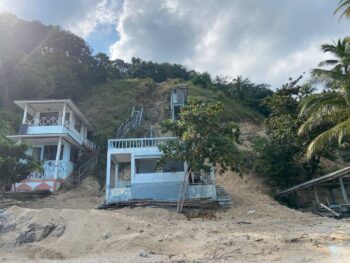 Secluded Haad Nam Tok Beach with serene surroundings and natural beauty on Koh Phangan.