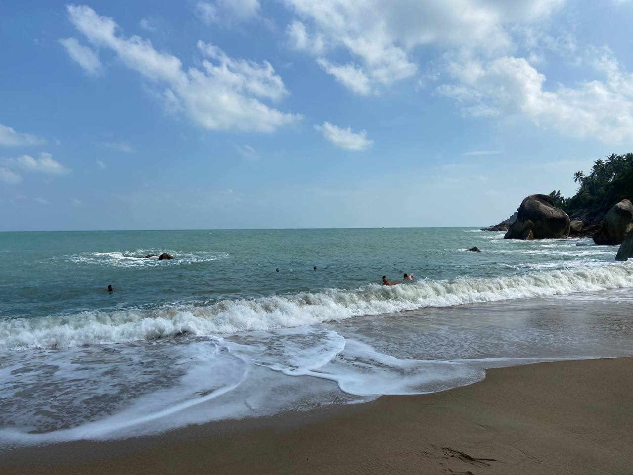 Secluded Haad Nam Tok Beach with serene surroundings and natural beauty on Koh Phangan.
