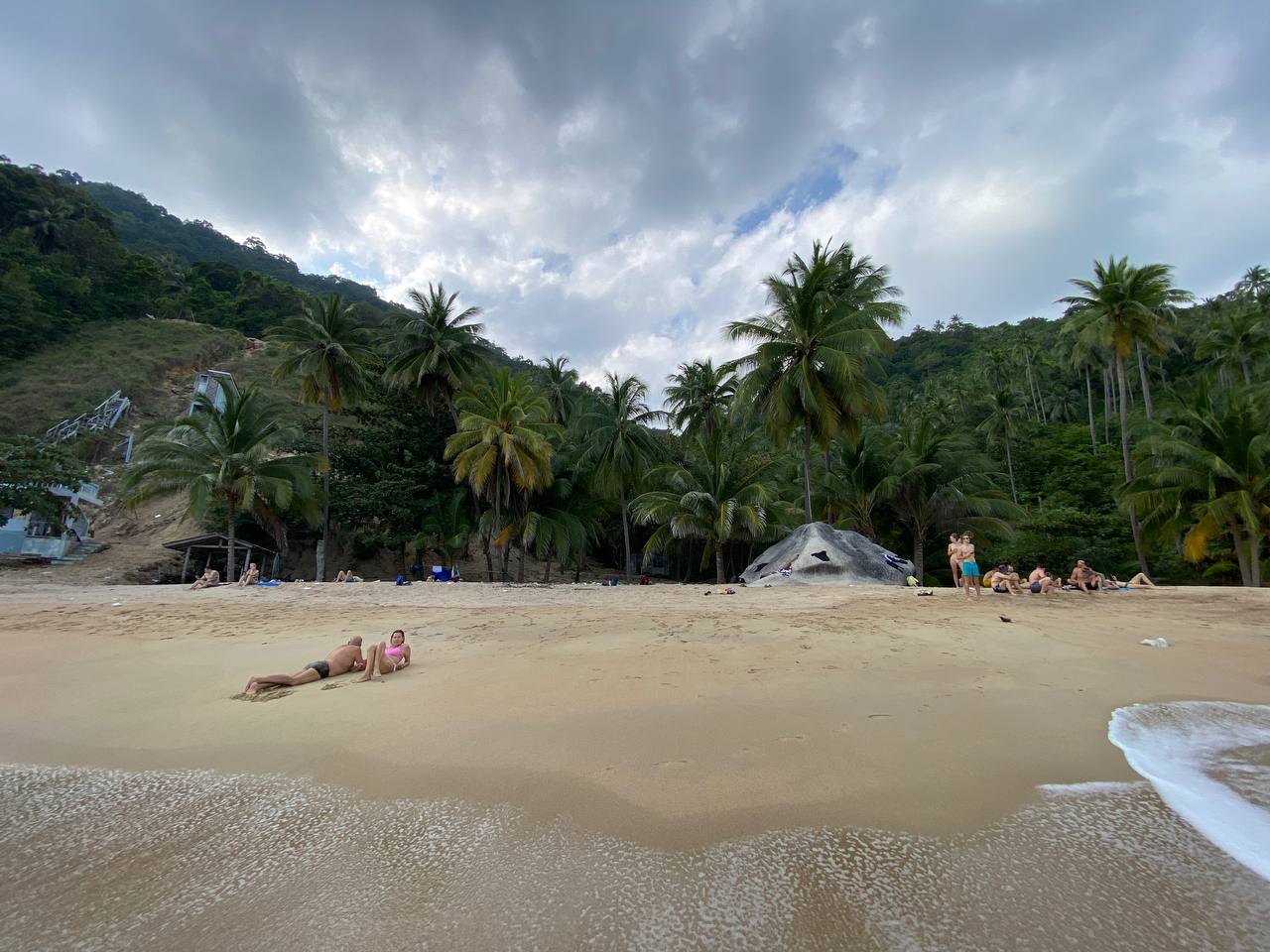 Secluded Haad Nam Tok Beach with serene surroundings and natural beauty on Koh Phangan.