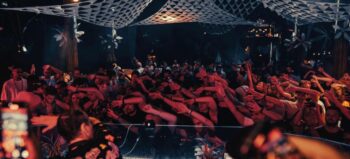 Waterfall Festival party in the jungle with music stages and lights