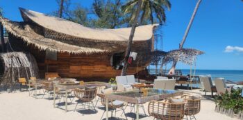 Harmony Beach Club Koh Phangan with sunbeds, cocktails, and sunset view