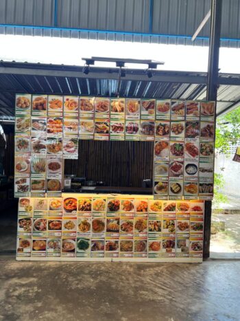 Food court seating and international food stalls at Boonmee Food Center on Koh Phangan