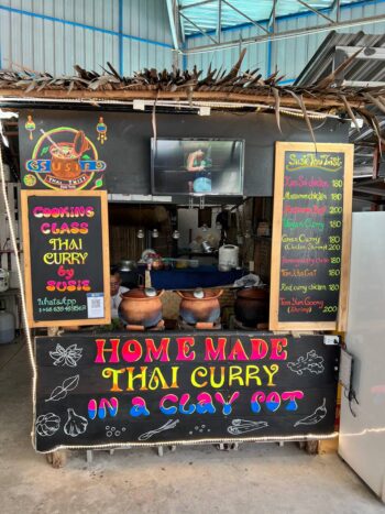 Food court seating and international food stalls at Boonmee Food Center on Koh Phangan
