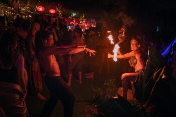 People dancing freely at an Ecstatic Dance event at Aum