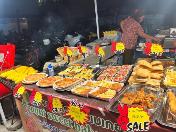 Full Moon Party on Koh Phangan at Haad Rin Beach with neon lights, beach crowd, DJs, and fire show