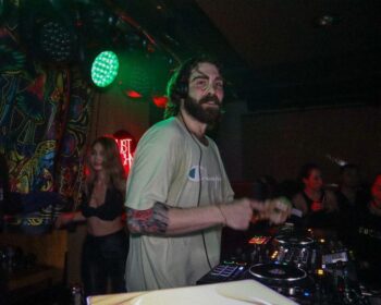 T ONE performing a DJ set (house music)