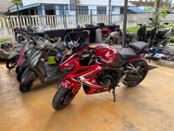 Modern rental scooters parked in Thong Sala, Koh Phangan