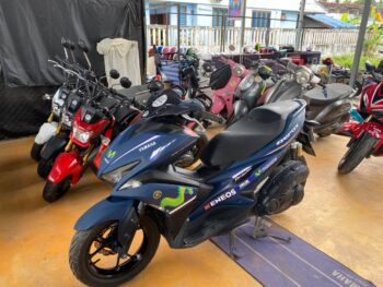 Modern rental scooters parked in Thong Sala, Koh Phangan
