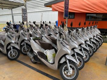 Modern rental scooters parked in Thong Sala, Koh Phangan