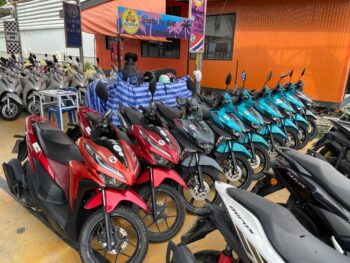 Modern rental scooters parked in Thong Sala, Koh Phangan