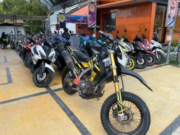 Modern rental scooters parked in Thong Sala, Koh Phangan