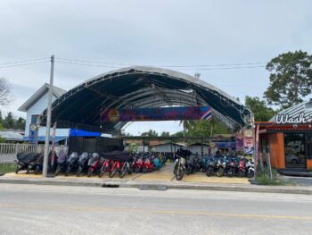 Modern rental scooters parked in Thong Sala, Koh Phangan