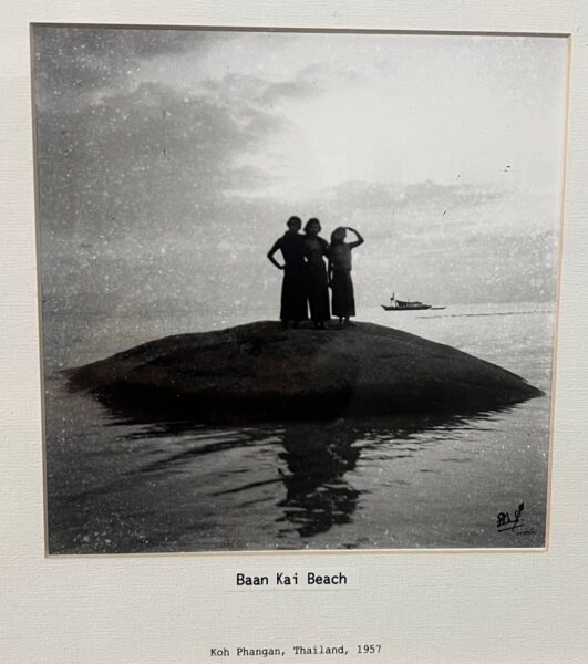 Three people standing on a rock at Baan Kai Beach on Koh Phangan in 1957