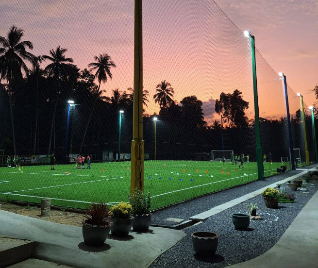 Modern football field at Atletikoh Phangan Football Center on Koh Phangan, offering training sessions, friendly matches, and more.