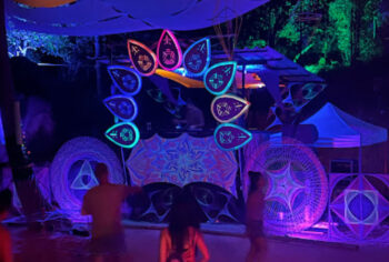 Moon Rock venue on Koh Phangan, featuring jungle surroundings, ocean views, and a vibrant atmosphere for both relaxation and parties.
