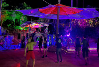 Moon Rock venue on Koh Phangan, featuring jungle surroundings, ocean views, and a vibrant atmosphere for both relaxation and parties.