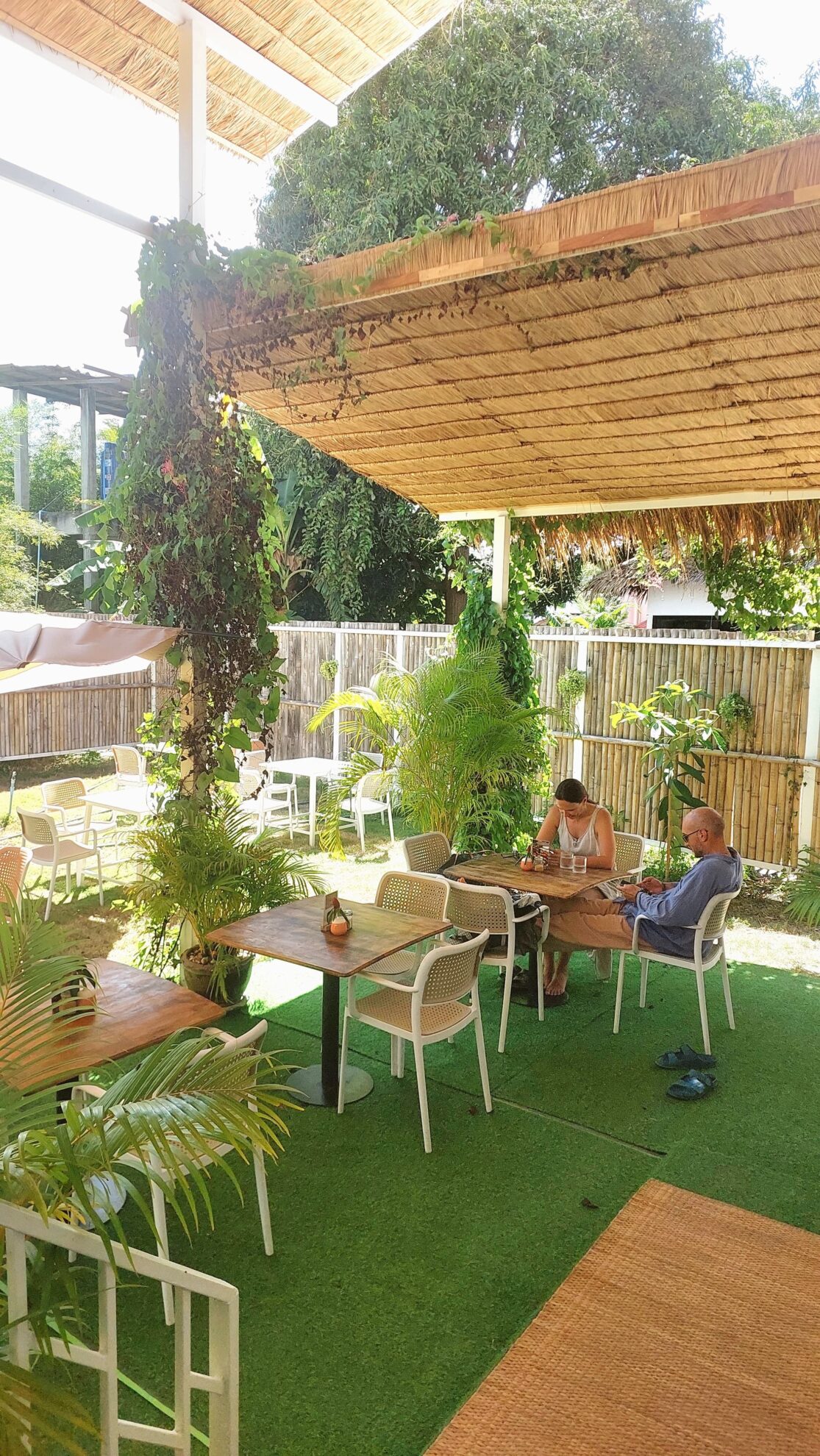 ETHOS Wholefood Café & Shala interior with garden and yoga-space atmosphere