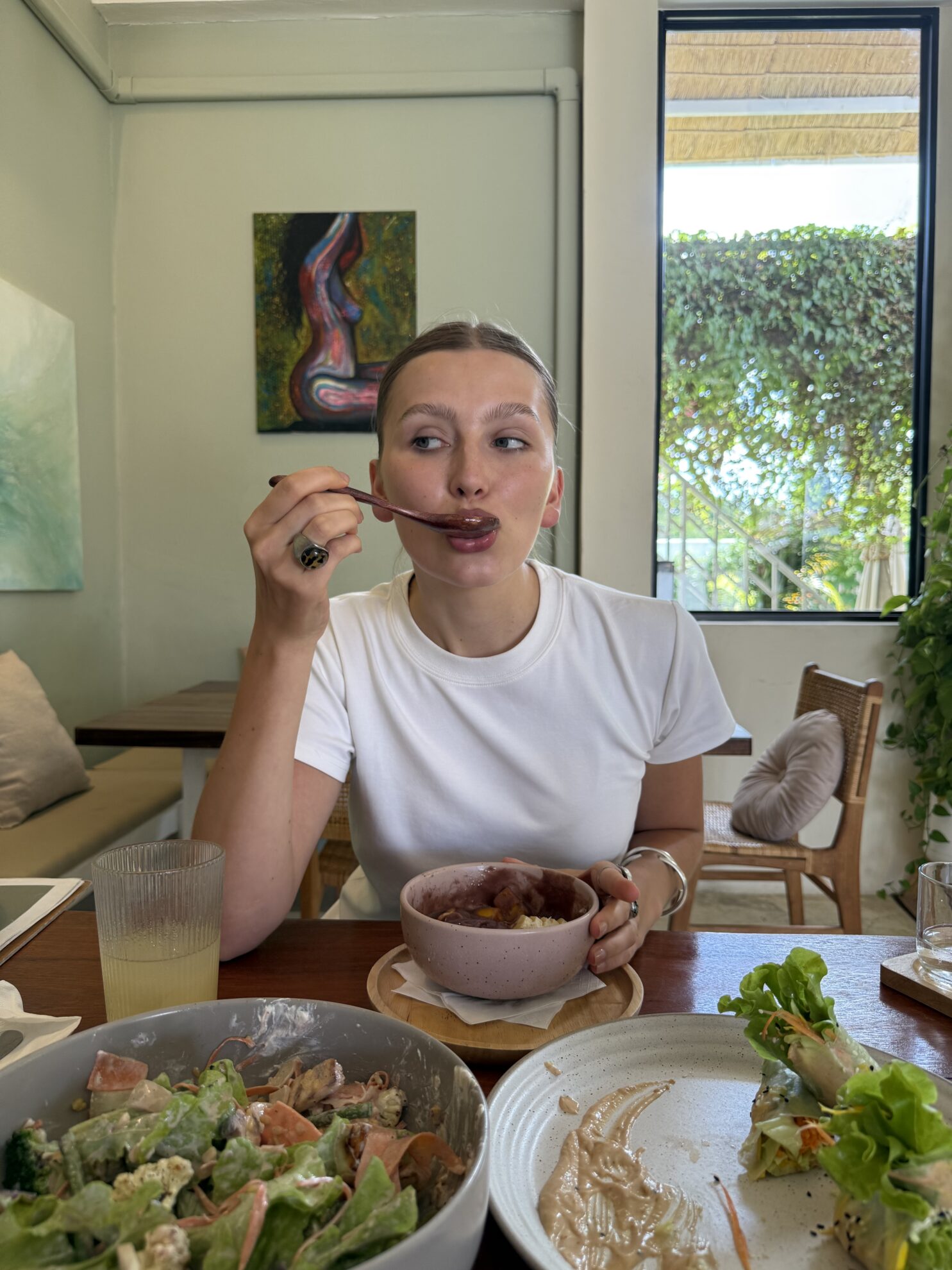 ETHOS Wholefood Café & Shala interior with garden and yoga-space atmosphere